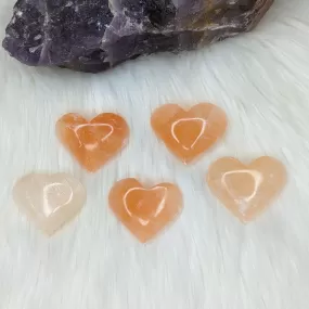 Orange Selenite Palm Stone Heart Carving